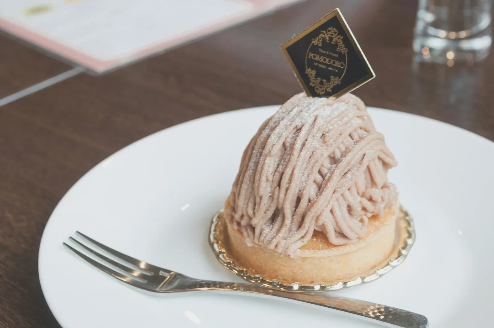 A dessert on a plate at a table